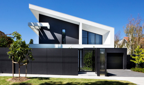 Красивый односкатный дом с геометрически четкими формами